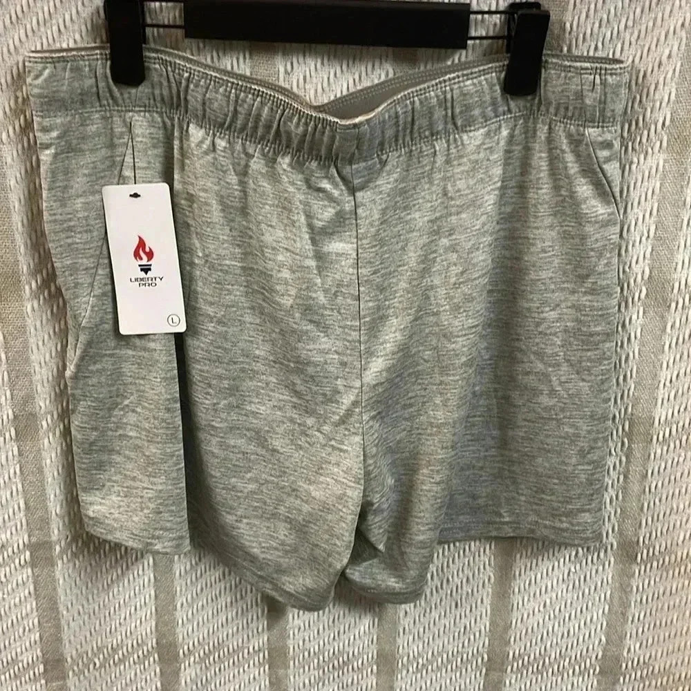 4 pack of Women’s Athletic Shorts NWT size Large - Picture 2 of 8